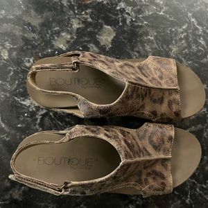 Corkys gently used size 7 Cheetah Print wedge  sandals. Super cute!!